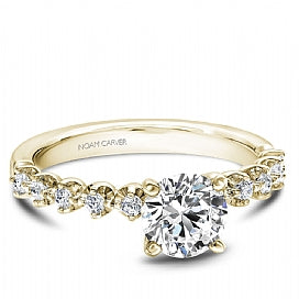 yellow gold shared prong engagement ring
