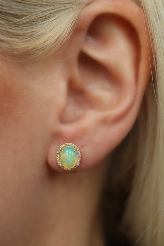 Genuine Opal Oval Cut Earrings Surrounded by a Halo of Diamonds