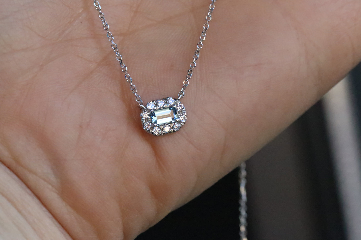 Emerald Cut Aquamarine Surrounded by a Diamond Halo