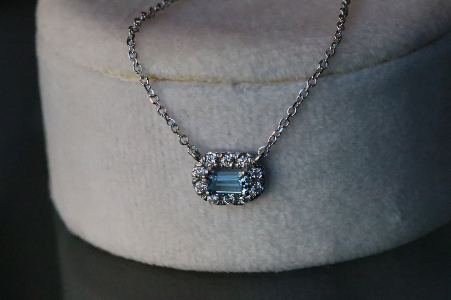 Emerald Cut Aquamarine Surrounded by a Diamond Halo