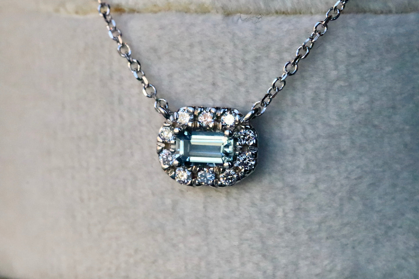 Emerald Cut Aquamarine Surrounded by a Diamond Halo