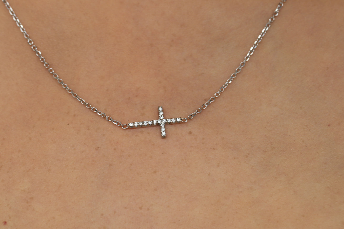 Small Diamond Sideways Necklace Cross in Solid 14kt