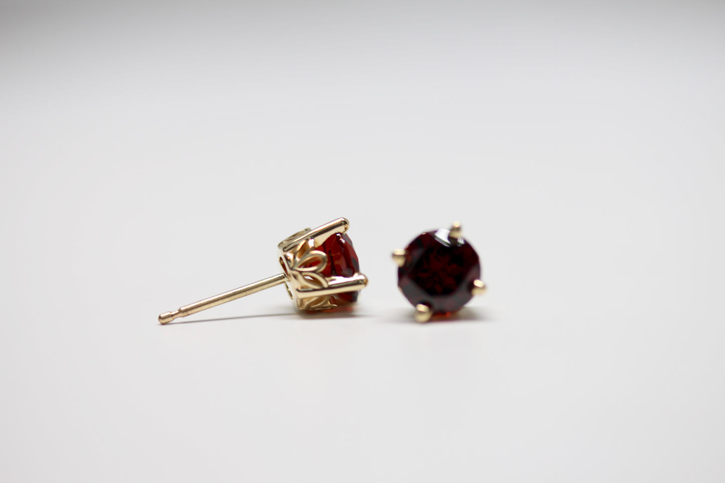 Mozambique Garnet Scroll Design Round 4-Prong Stud Earrings