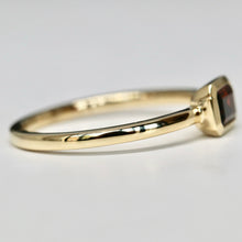 Bezel set Emerald Cut Garnet Ring in 14k Gold