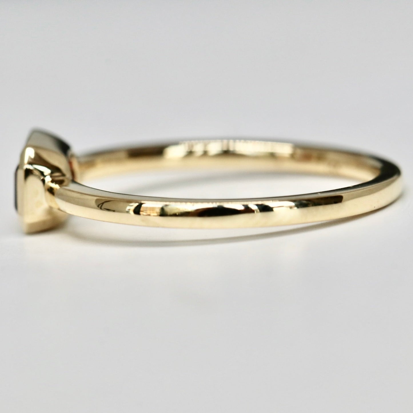 Bezel set Emerald Cut Garnet Ring in 14k Gold
