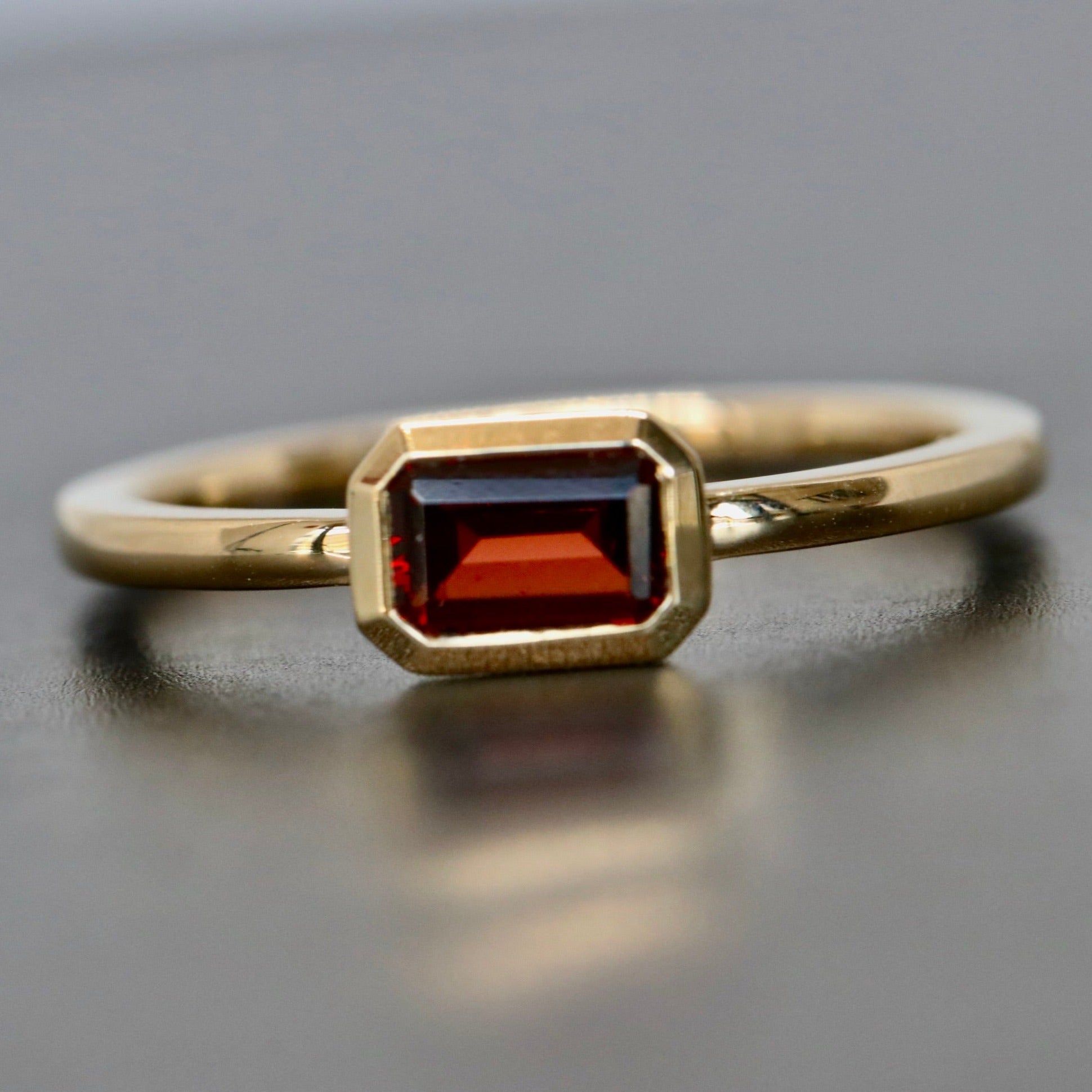 Garnet bezel solitar ring