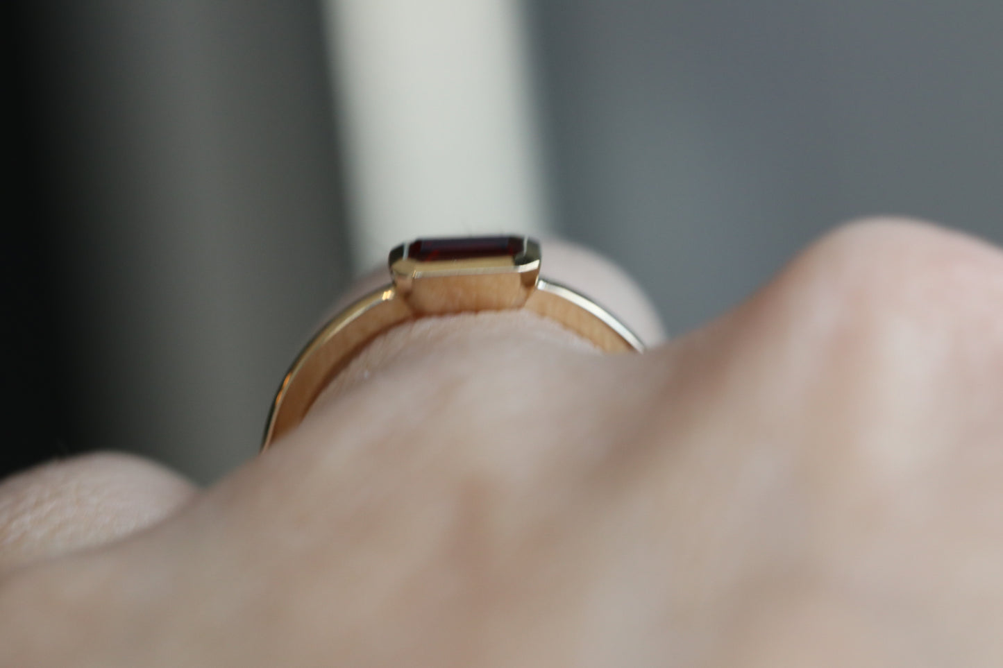 Bezel set Emerald Cut Garnet Ring in 14k Gold