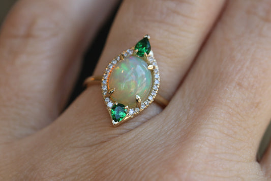 Oval Opal Cut, Green Garnet, and Diamond Halo Ring in Solid 14kt Gold