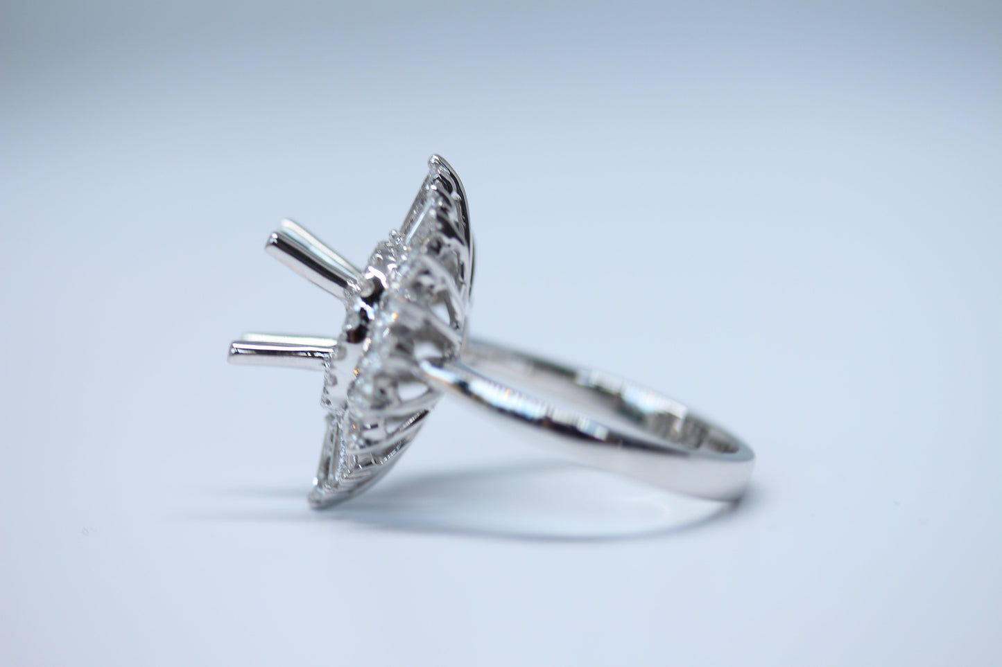 Art Deco Inspired Diamondaire Engagement Ring with Round and Baguette Diamonds