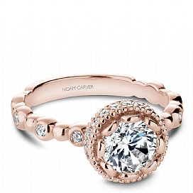 rose gold diamond engagement ring with a decorative head