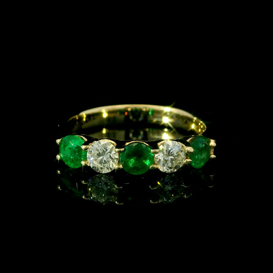 emerald and round diamond ring