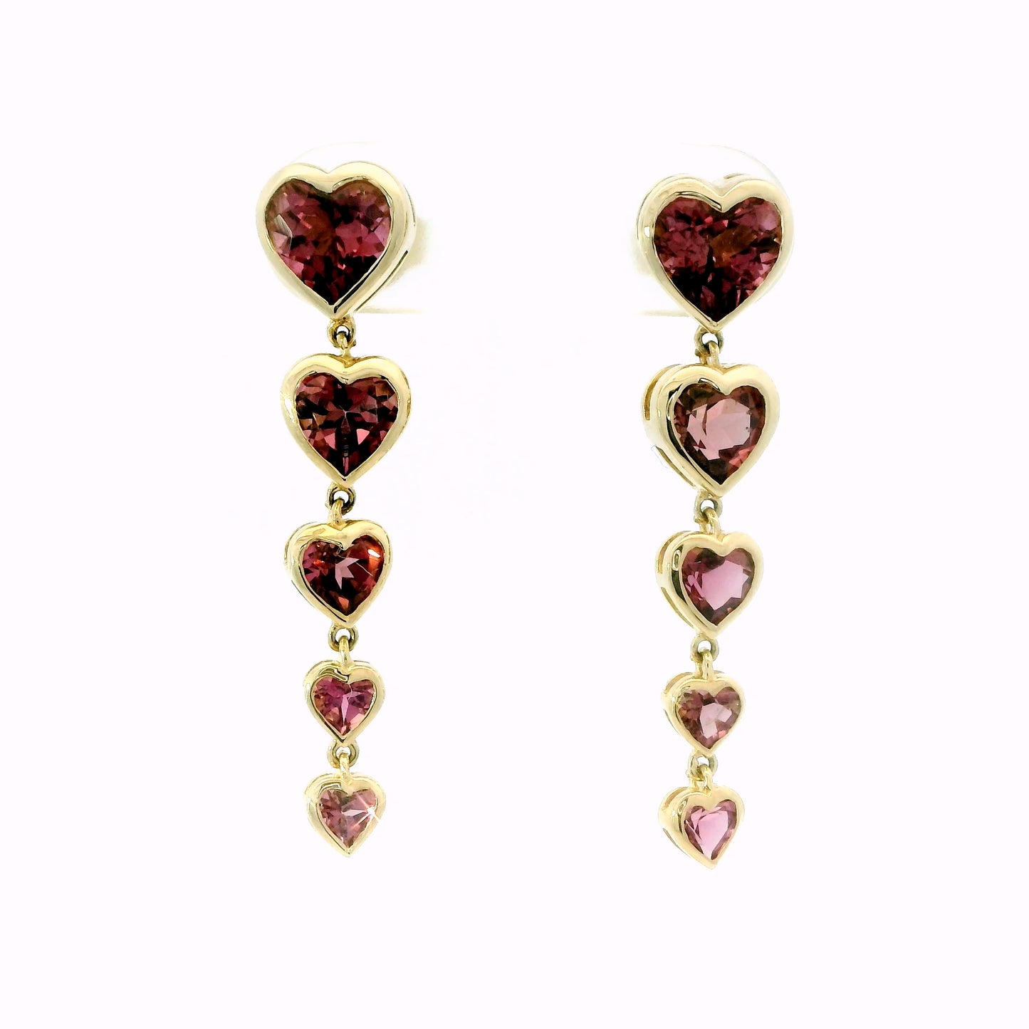 Pink tourmaline heart dangle earrings in 14k yellow gold