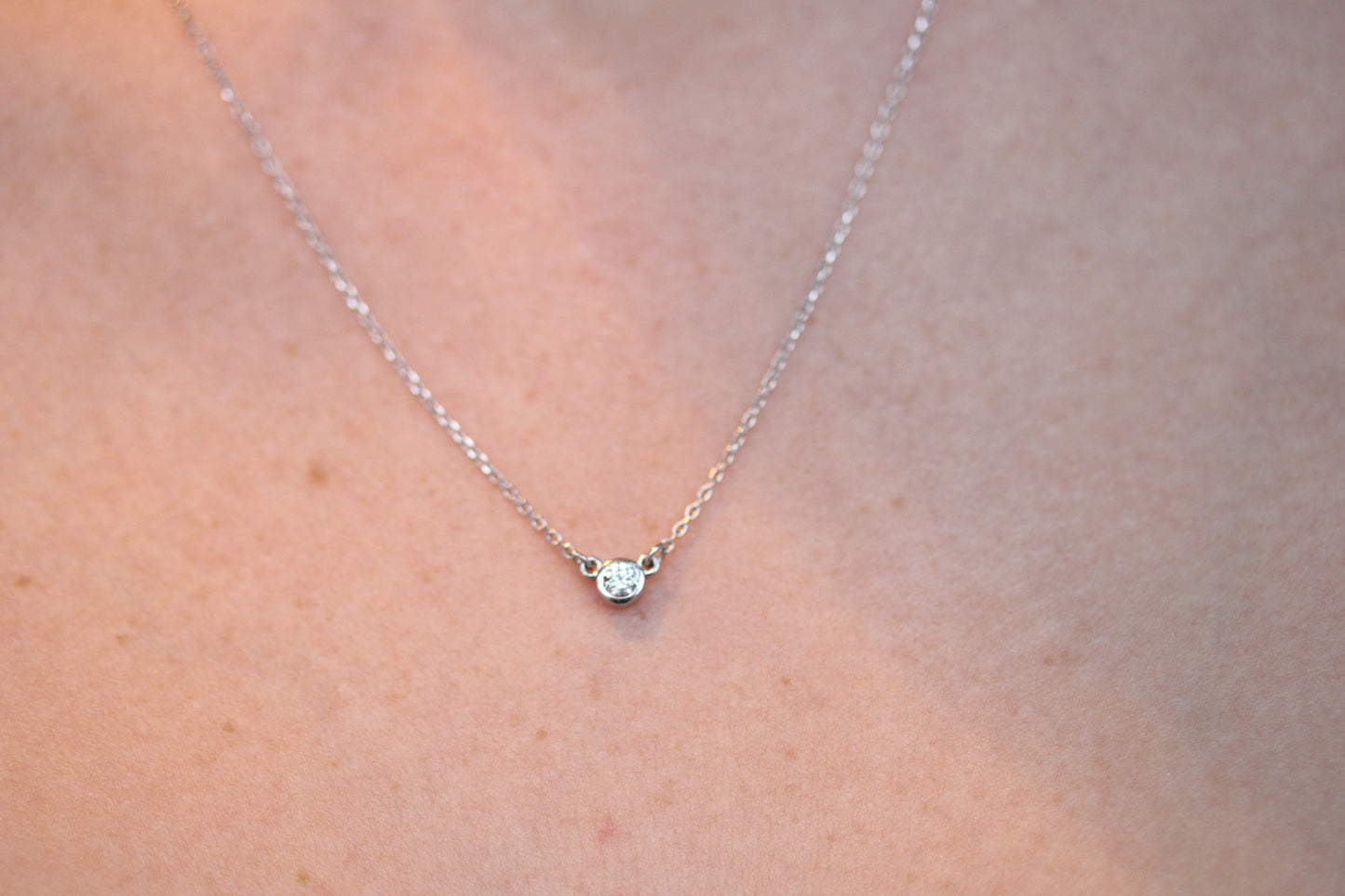 Timeless Bezel Set Round Diamond Pendant In 14kt Gold