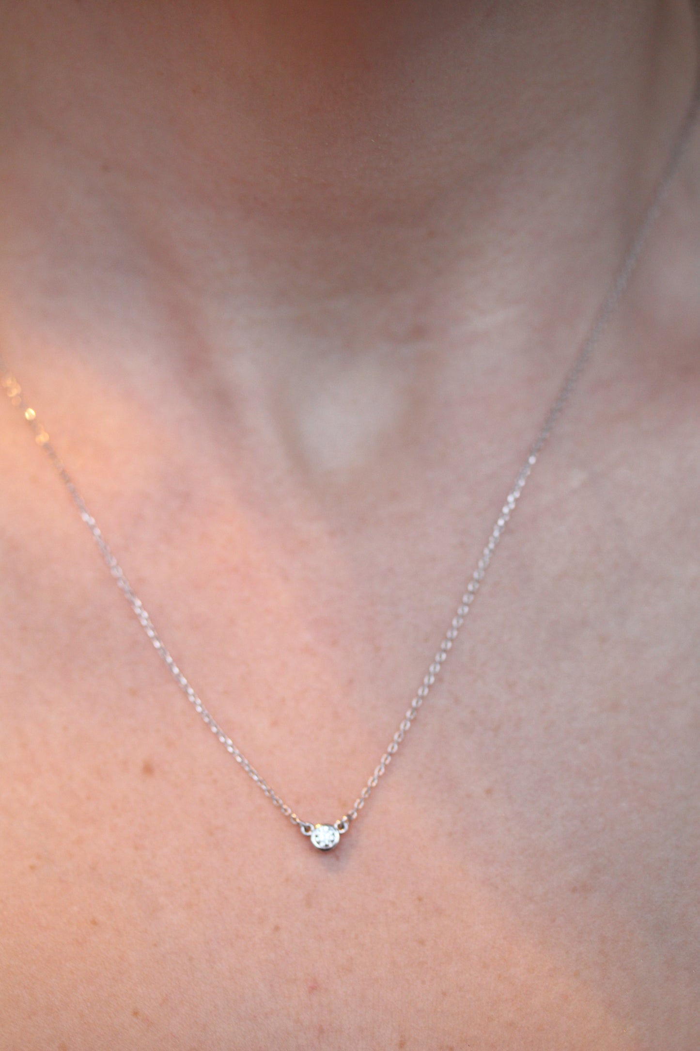 Timeless Bezel Set Round Diamond Pendant In 14kt Gold