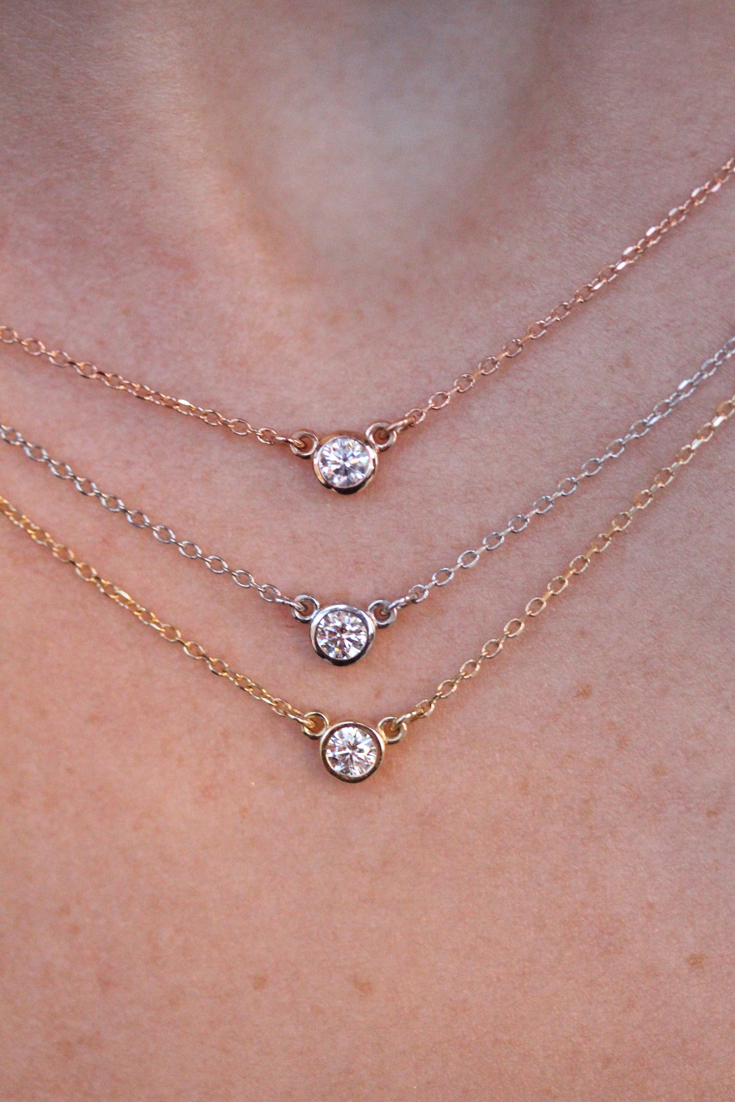 Timeless Bezel Set Round Diamond Pendant In 14kt Gold