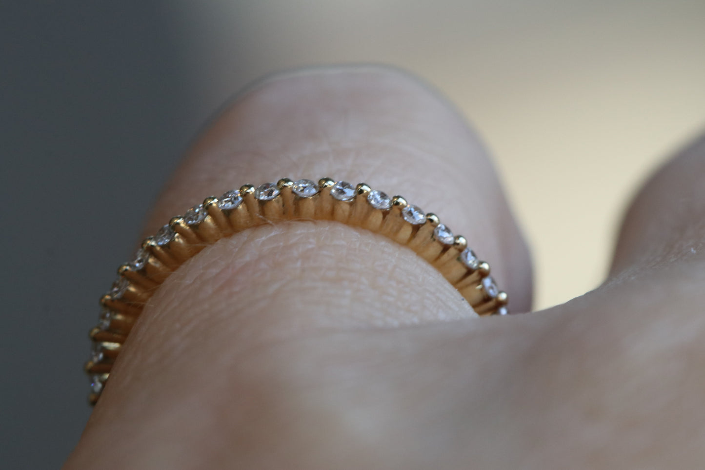 14kt Yellow Gold and Diamonds Eternity Single Prong Band in Size 7