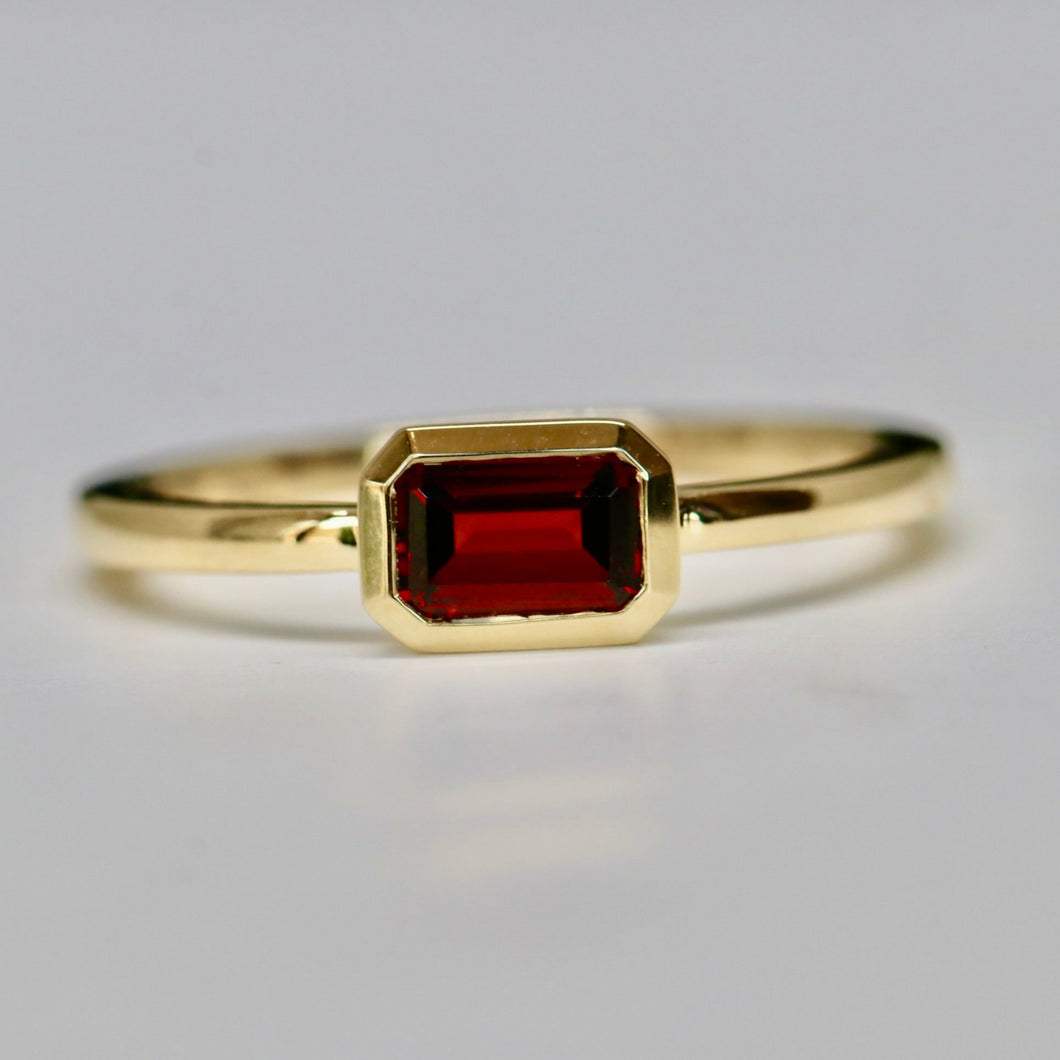Bezel set Emerald Cut Garnet Ring in 14k Gold