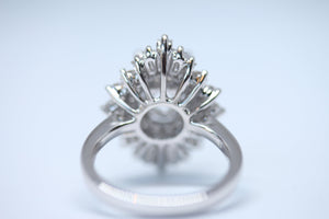Art Deco Inspired Diamondaire Engagement Ring with Round and Baguette Diamonds