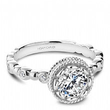 white gold bezel set round diamond engagement ring with channel set shank