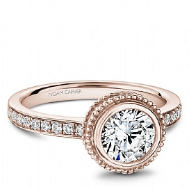rose gold bezel set engagement ring for a round diamond