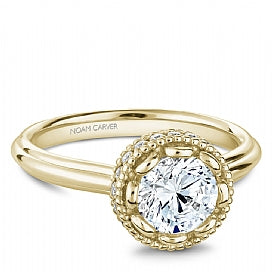 yellow gold diamond solitaire engagement ring with decorative head