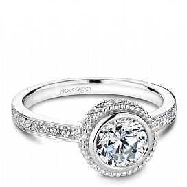 bezel set round diamond engagement ring with channel set head