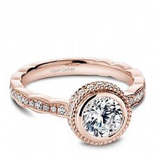 rose gold bezel set halo engagement ring for a round diamond