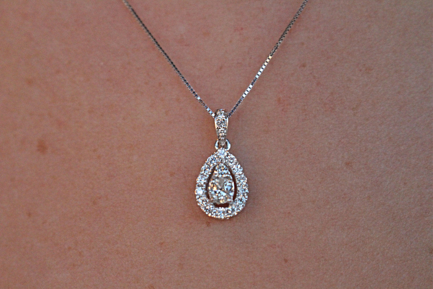 Pear Shaped Halo Diamond Pendant With Bail