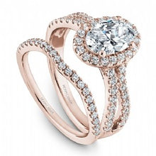 Rose gold diamond halo engagement ring